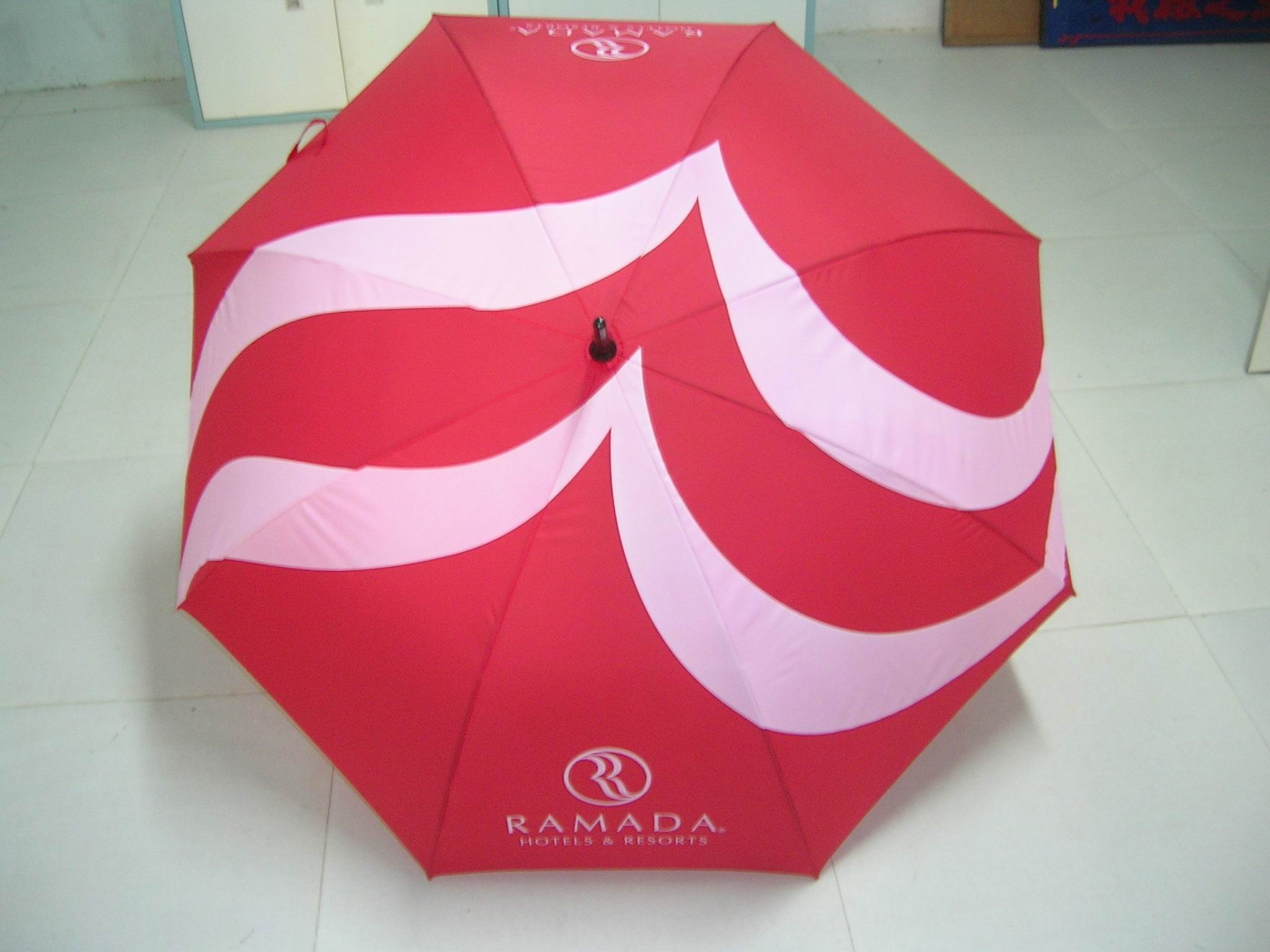 Large custom umbrellas supplied for a hotel and hospitality service project