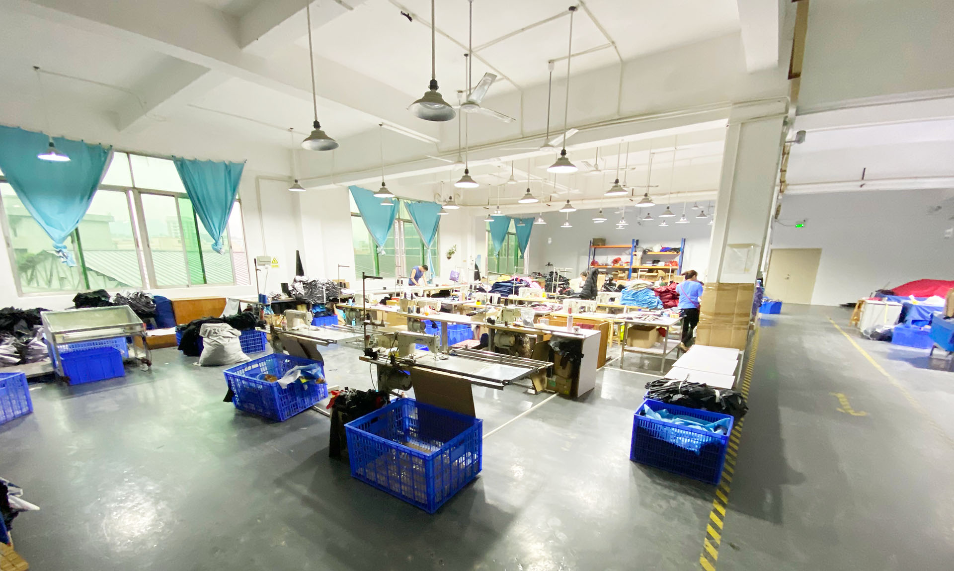 YJ Umbrella project support team reviewing custom umbrella order requirements
